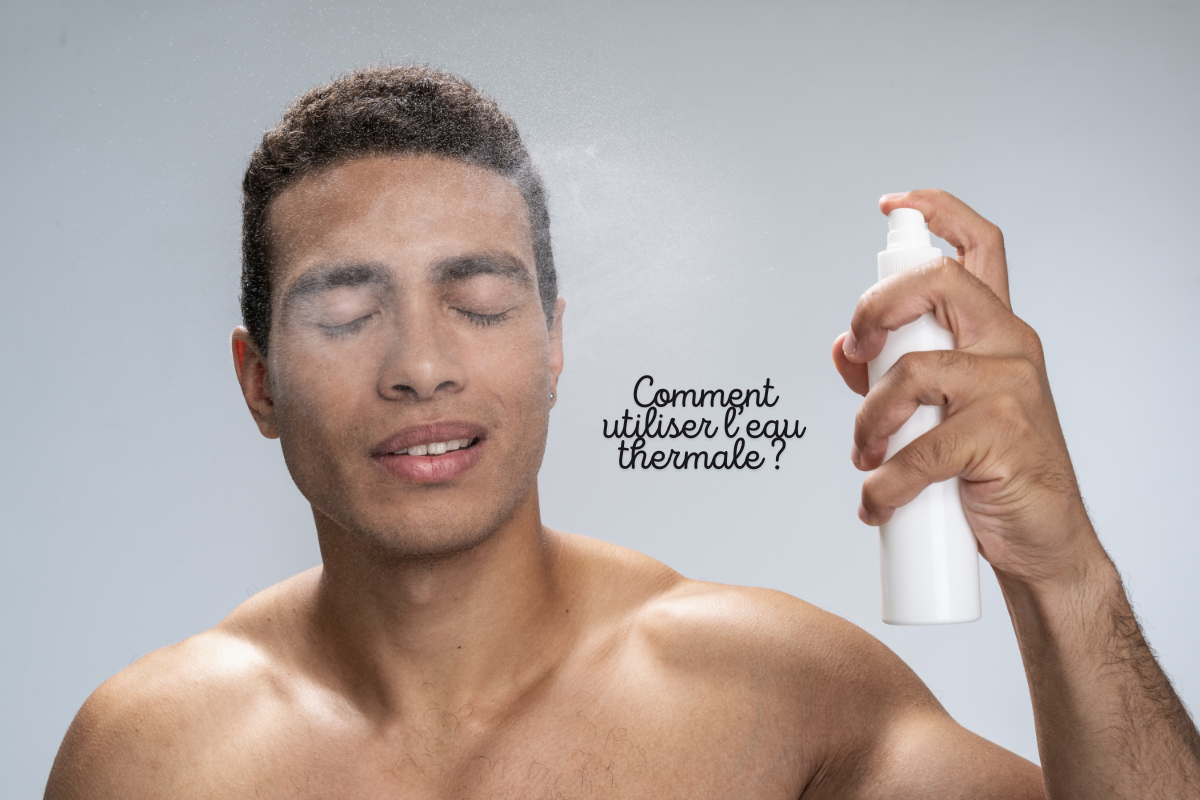 Homme utilisant un brumisateur d’eau thermale sur le visage pour apaiser et hydrater naturellement sa peau