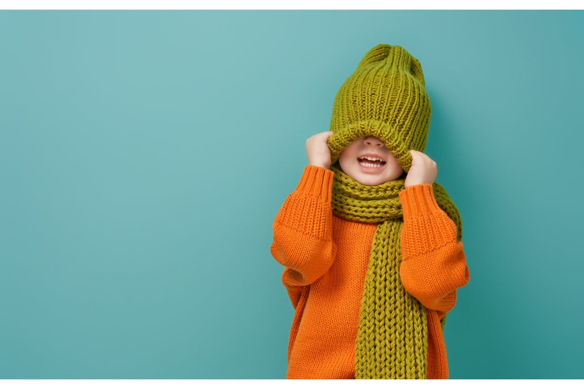 L'image représente un enfant avec un bonnet et une écharpe, prêt à affronter le froid de l'hiver. Comment passer l'hiver tranquille grâce à phytorub
